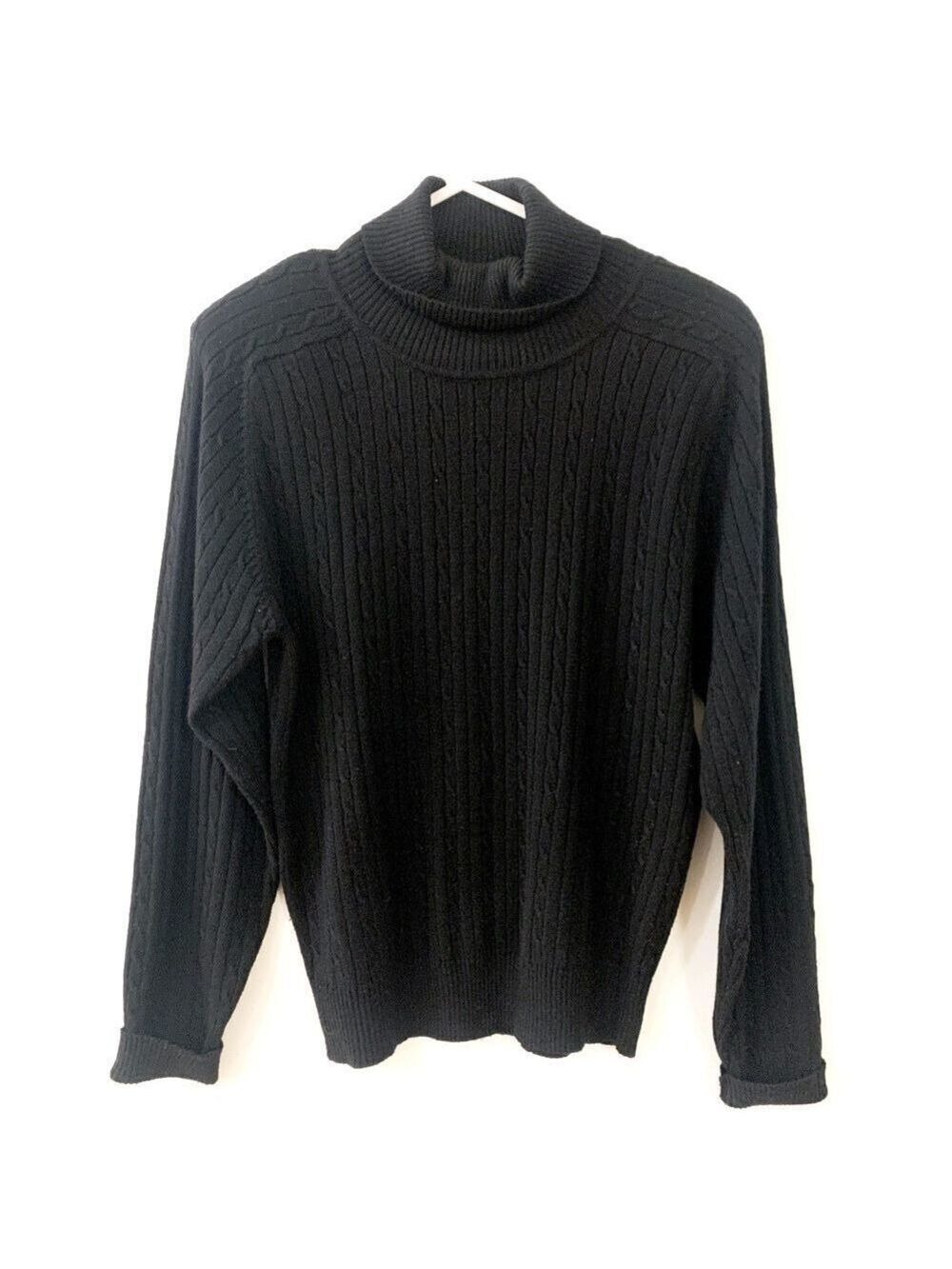 Black acrylic cable knit turtle neck.